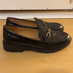 Black Loafers with Gold Accents